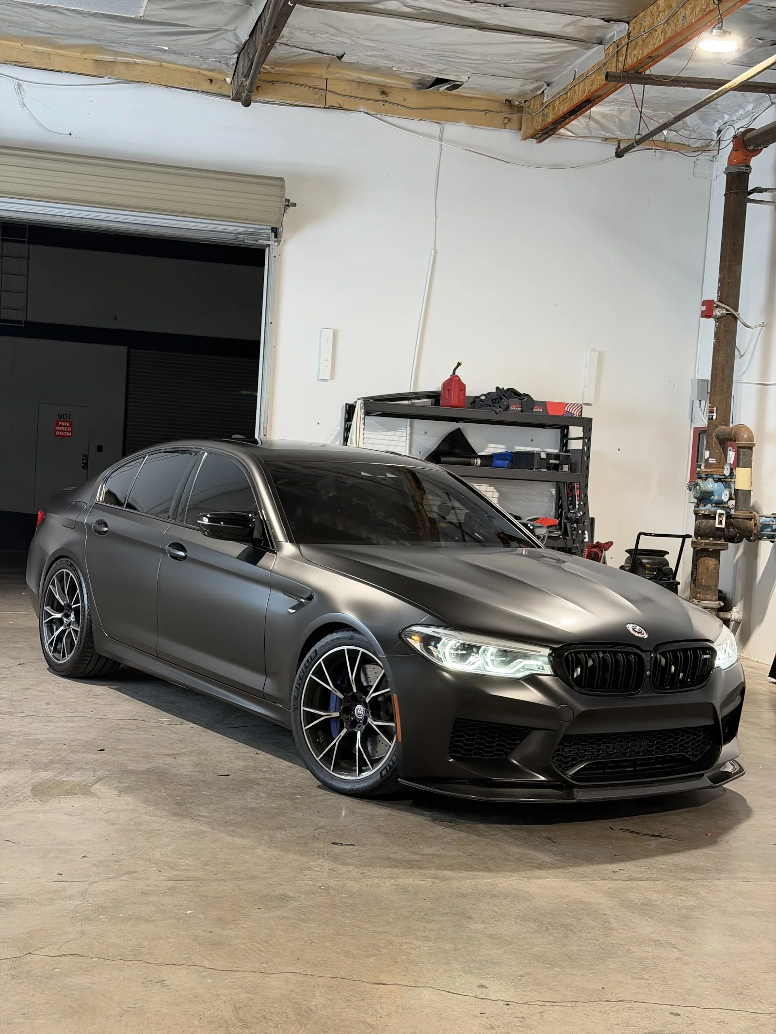 Matte-wrapped BMW M5 with tinted windows at SVR Auto Lab, Phoenix